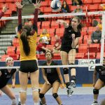 Kelly Behrbaum follows through on a spike against Capital. Photo courtesy of Willy Paine.