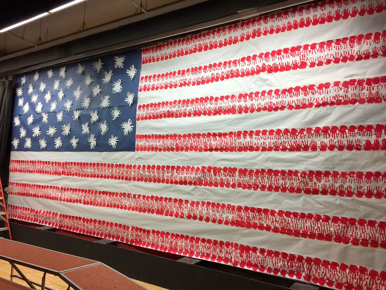 Island Park Elementary students contributed their handprints to making this flag to honor veterans. Photo courtesy of Craig Degginger