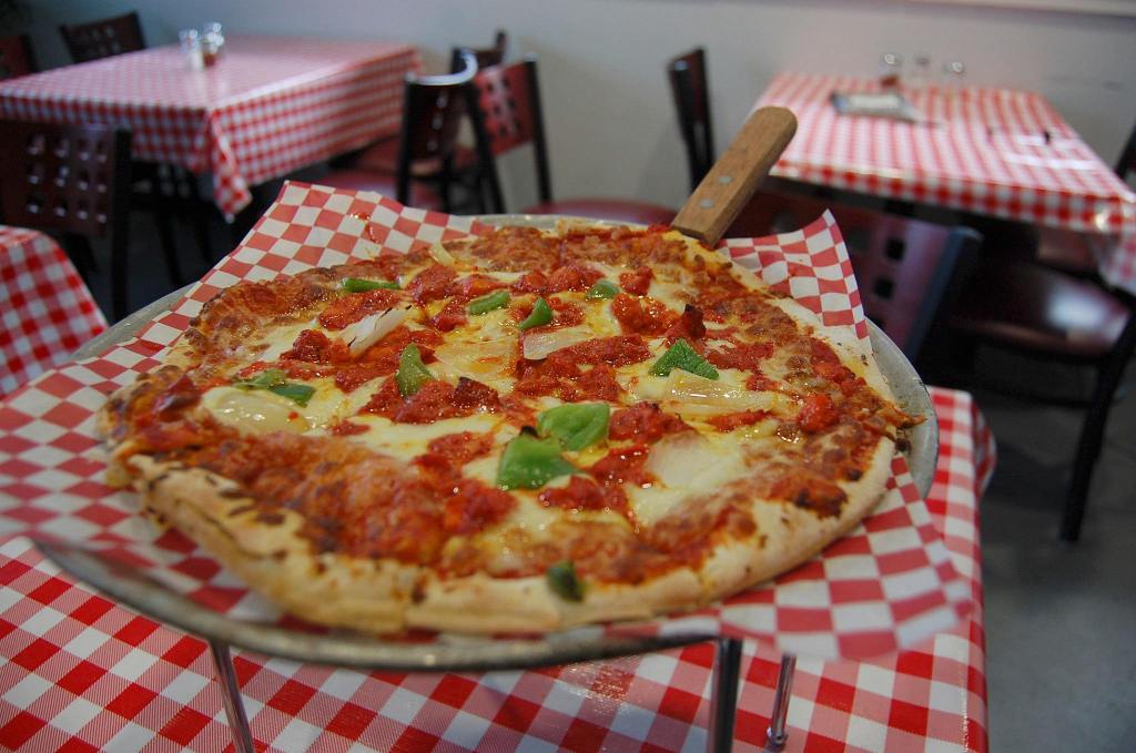 A tandoori chicken pizza, with onions, green pepper, mushrooms and cilantro. Katie Metzger/staff photo