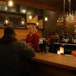 A bartender serves some of the first customers at Mioposto in Mercer Island on Jan. 12. Katie Metzger/staff photo
