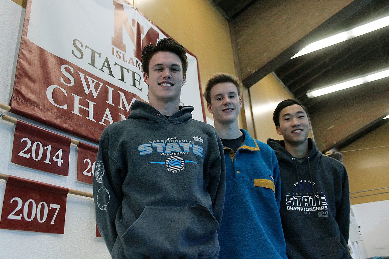 From left, Mercer Island swim captains Jimmy Markwith, Hunter Peshkin and Chris Shin (Joe Livarchik/staff photo).