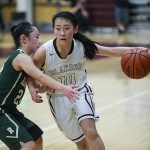 Photo courtesy of Rick Edelman/Rick Edelman Photography                                Mercer Island point guard Kailee Yan, right, scored 17 points against the Redmond Mustangs on Jan. 20.