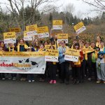 Students and staff at Yellow Wood Academy, a nonprofit private school in Mercer Island, hold up signs and wear scarves to celebrate School Choice Week on Jan. 25. Katie Metzger/staff photo