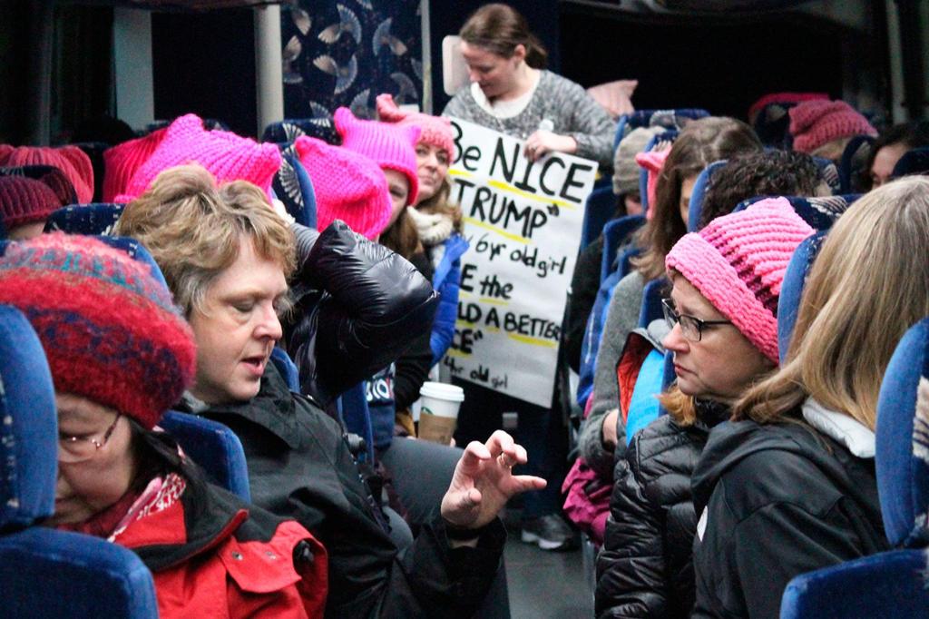 Women heading to the march talk about the new administration. Eastside residents had an array of reasons for marching on Jan. 21. Allison DeAngelis/Bellevue Reporter