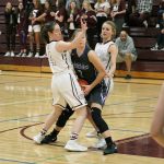 Mercer Island&rsquo;s Claire Mansfield (4) and Jackie Stenberg converge defensively on Lake Washington&rsquo;s Lindsay Allan Tuesday at Mercer Island High School. The Islanders beat the Kangs 69-24 (Joe Livarchik/staff photo).