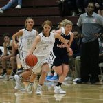 Mercer Island&rsquo;s Jessie Stenberg leads the fast break for the Islanders against Eastside Catholic Saturday at MIHS. The Islanders beat the Crusaders 68-49 (Joe Livarchik/staff photo).