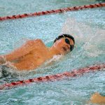 Mercer Island&rsquo;s Nate Robinson competes in the 100 yard backstroke during the 3A SeaKing district swim championships Saturday at Mary Wayte Pool. Robinson placed eighth overall with a time of 56.35 (Joe Livarchik/staff photo).