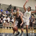Photo courtesy of Don Borin/Stop Action Photography                                Mercer Island junior guard Jessie Stenberg controls the ball while being guarded by Bishop Blanchet star player Jadyn Bush. Bishop Blanchet defeated Mercer Island 48-47 in a Class 3A regional playoff game on Feb. 24 at Bothell High School.
