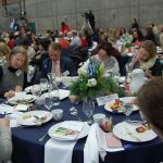 Islanders write checks to the MIYFS Foundation during the annual fundraising breakfast on Feb. 8. Katie Metzger/staff photo