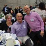 Former Island Books owners Nancy and Roger Page smile with Jeff Sanderson, former Stopsky&rsquo;s owner and current Mercer Island City Council member, at the MIYFS Foundation Breakfast. Katie Metzger/staff photo