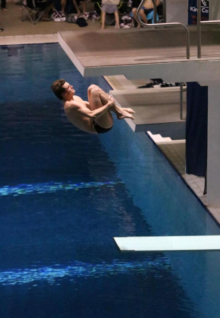 Mercer Island&rsquo;s Ben Dixon competes in the one-meter dive at the 3A state championship meet (Joe Livarchik/staff photo).