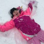 Sarah Simpson, 11, makes snow angels in Northwood playfield. Photo courtesy of Aurora Bearse