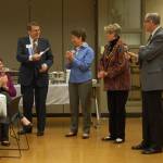 Mercer Island Chamber board member Emmett Maloof, Youth and Family Services Director Cindy Goodwin, retiring Chamber Director Terry Moreman and Chamber President Ralph Swanson laugh at the March 2 chamber luncheon. The community is invited to a reception for Moreman from 5:30-7:30 p.m. Thursday. Katie Metzger/staff photo