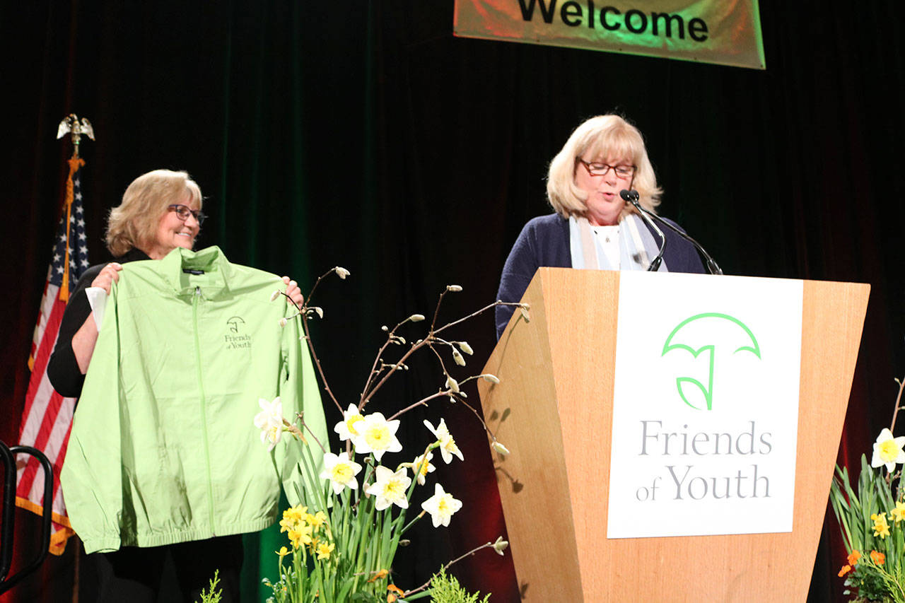 Washington state&rsquo;s First Lady Trudy Inslee and Friends of Youth CEO and Islander Terry Pottmeyer speak at the March 15 Celebration of Youth fundraiser. Samantha Pak/Redmond Reporter