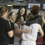 Photo courtesy of Don Borin/Stop Action Photography                                The Mercer Island Islanders celebrate after defeating the Bishop Blanchet Braves 52-47 in the Class 3A girls state championship game on March 4 at the Tacoma Dome.
