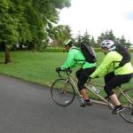 Cyclists ride a tandem bike on Mercer Island&rsquo;s Lid. File photo