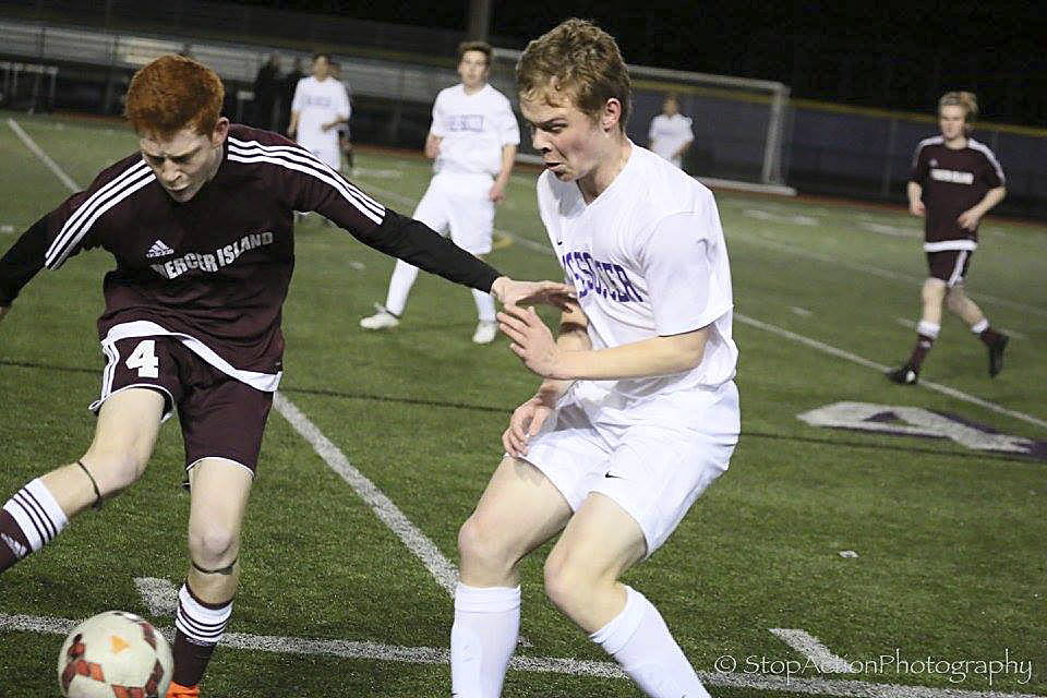 Photo courtesy of Don Borin/Stop Action Photography                                Mercer Island captain Jack Delay, left, controls the ball while being guarded by an Issaquah player. The Eagles defeated the Islanders 2-1 in a non-league game on March 15 in Issaquah.