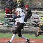 Photo courtesy of Don Borin/Stop Action Photography                                Mercer Island Islanders junior Olivia Kane connects on a hit against the Sammamish Totems. Kane finished the game with three hits. The Islanders defeated the Totems 20-7 on March 22 at South Mercer playfields in Mercer Island