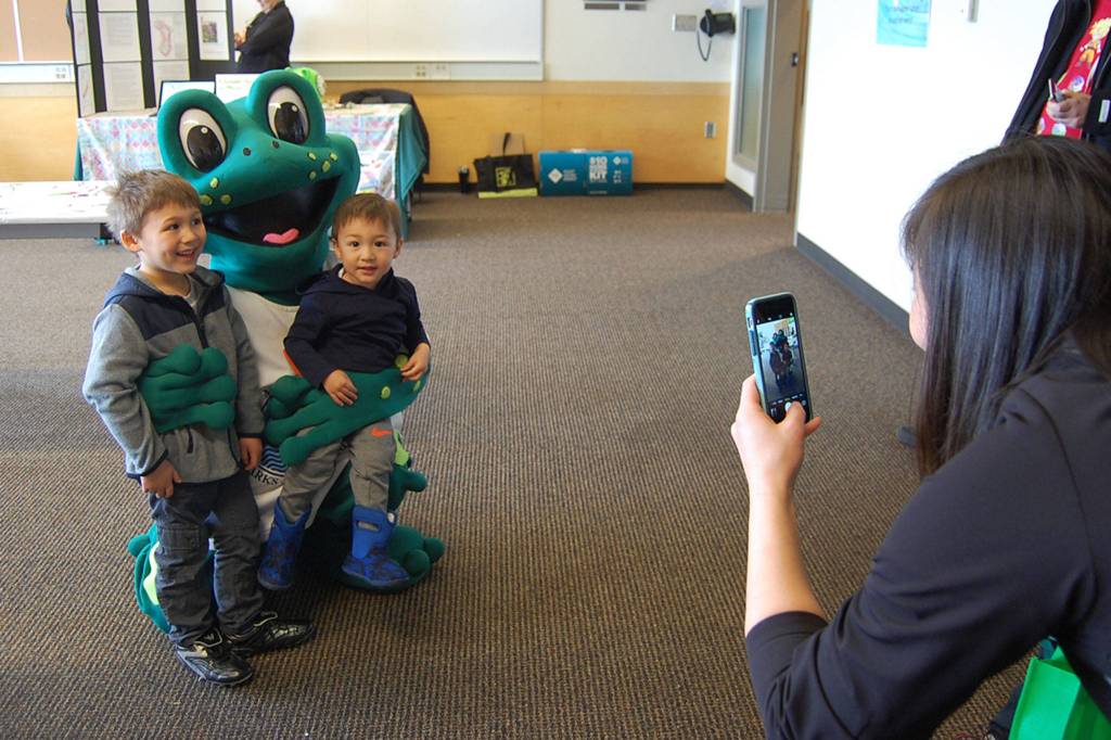 Max and Corbin Given, ages 4 and 2, pose with Leap at Saturday&rsquo;s fair. Katie Metzger/staff photo