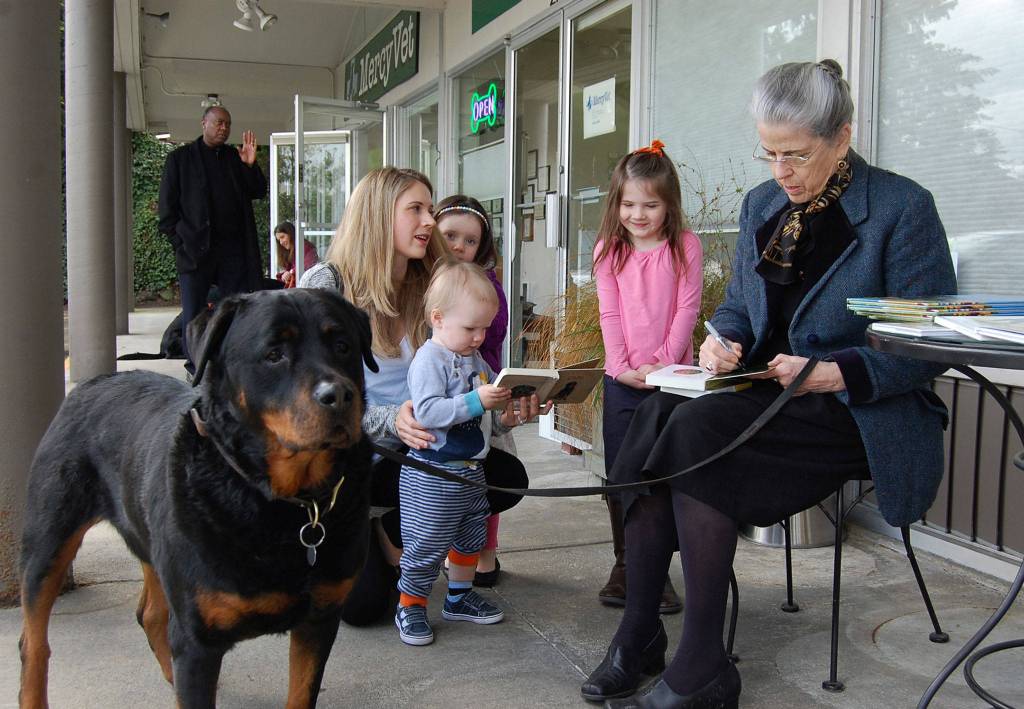 The Hay family gets books signed by Alexandra Day on April 14. Katie Metzger/staff photo