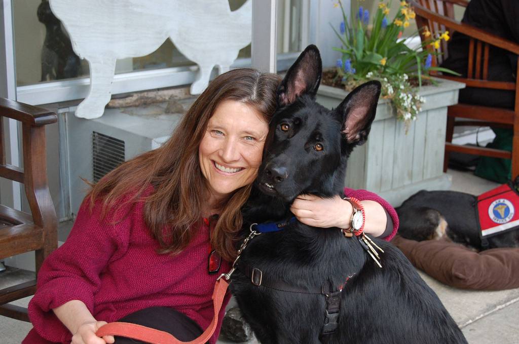 Author Tracy Weber poses with her dog, Ana, at a book signing event at Mercer Island&rsquo;s MercyVet on April 14. Katie Metzger/staff photo