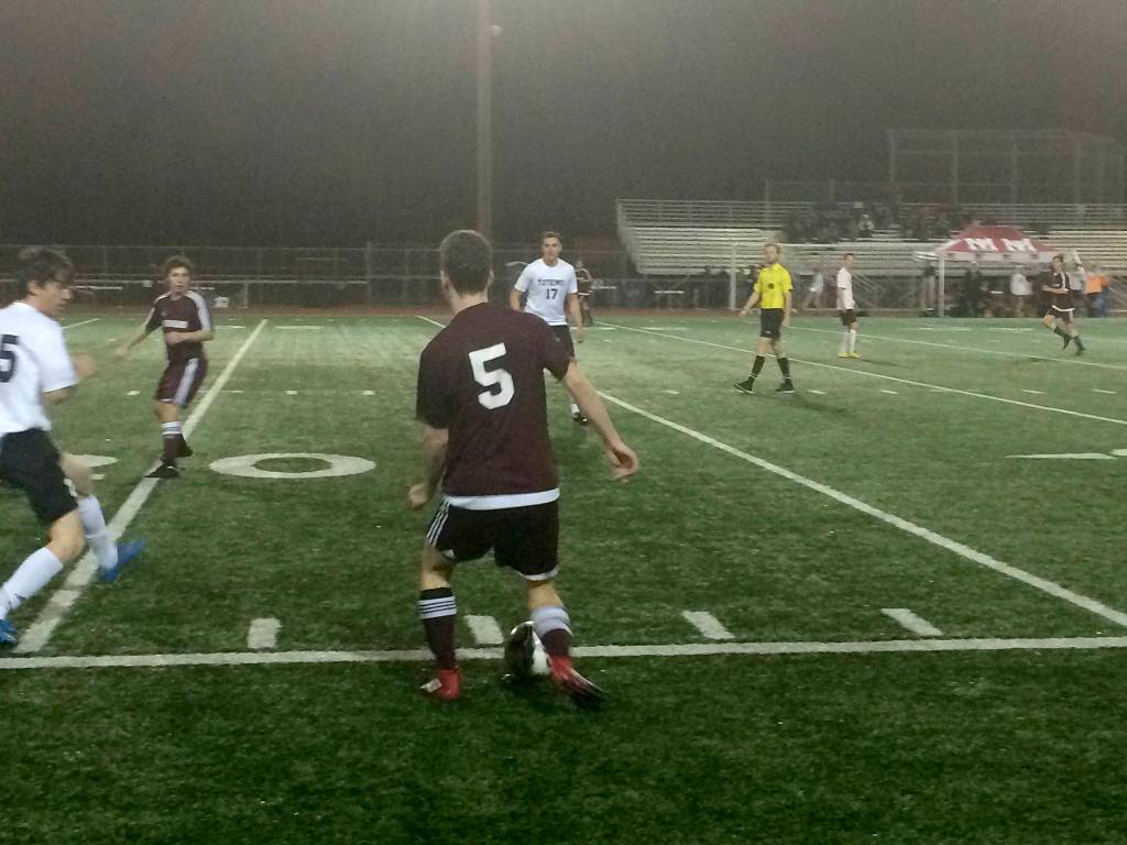 Shaun Scott, staff photo                                Mercer Island Islanders junior midfielder Emil Talerman (No. 5) scored a game-high four goals against the Sammamish Totems on April 4 in Bellevue. The Islanders defeated the Totems 9-0.