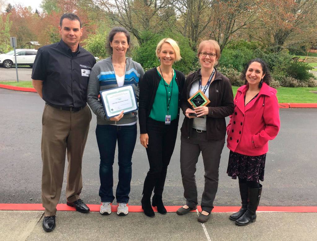 Members of Lakeridge&rsquo;s Green Team pose after receiving the Green Ribbon award. Photo courtesy of Nancy Weil
