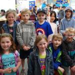 The Lakeridge K-Kids are supporting second grader Ewan Lill (center) by selling bracelets to raise money for cancer research. Katie Metzger/staff photo
