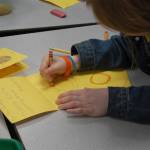 K-Kids write thank you cards for teachers and community members who helped them with their fundraising project at their May 4 meeting. Katie Metzger/staff photo