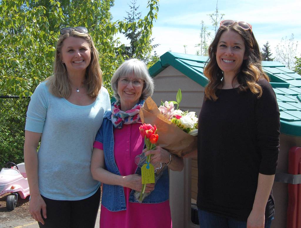 MIPA Co-VPs of Preschool Jessica Apodaca and Amanda Colburn present Kathy Morey with the Exceptional Educator award. Katie Metzger/staff photo