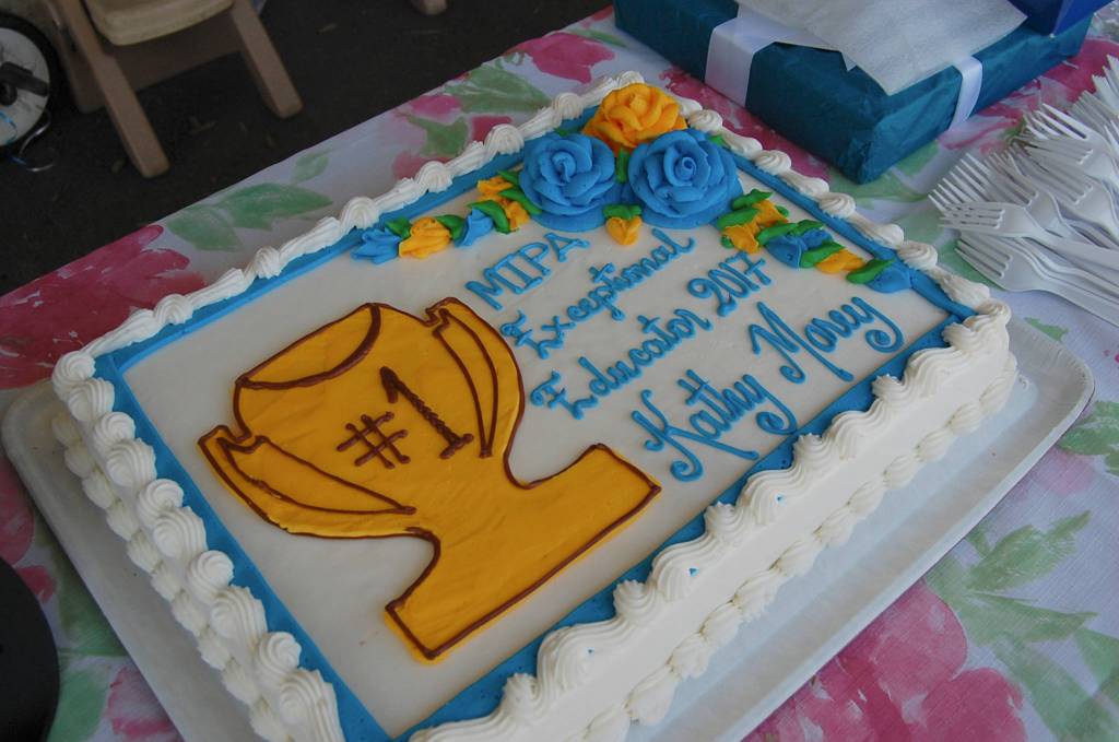 Morey received a cake and a plaque from MIPA, along with flowers and balloons from colleagues and students. Katie Metzger/staff photo