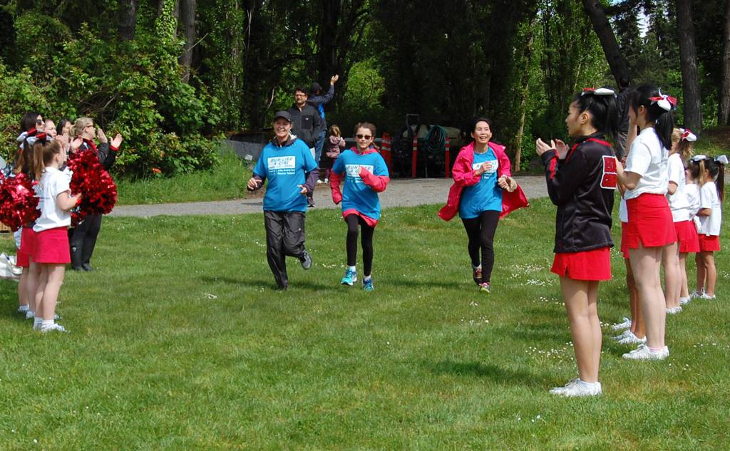 Runners near the finish line at Mercer Island&rsquo;s female 5K on Saturday. Katie Metzger/staff photo