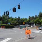 A driver navigates the intersection at 76th Avenue Southeast and North Mercer Way, which is under construction as part of Sound Transit&rsquo;s temporary traffic improvements, meant to mitigate impacts once the Interstate 90 center lanes close on June 3. Katie Metzger/staff photo