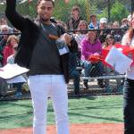 Seattle Mariners baseball player Nelson Cruz greets the crowd at the annual Mercer Island Little League opening day ceremony on May 6 at the South Mercer Playfields. Photo courtesy of Kym Otte