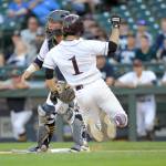 Photo courtesy of Patrick Krohn                                Mercer Island senior Noah Hsue slides into home-plate in the Class 3A state semifinals against the Southridge Suns on May 26 at Safeco Field. Southridge defeated Mercer Island 5-4.