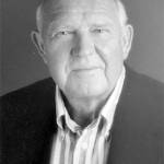 ROBERT E. CARLSON