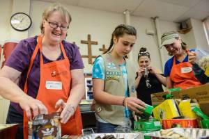 Mercer Island Girl Scouts volunteer time, cookies to homeless