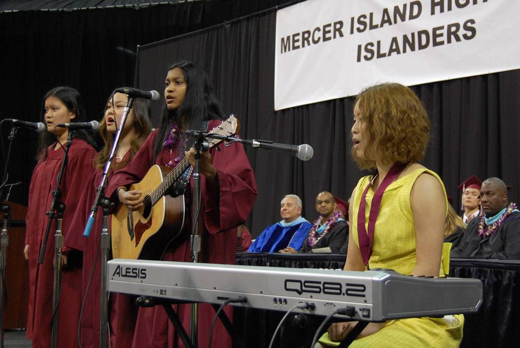 Marine Huang, Unica Le, Ria Raychaudhuri and Sophie Tan perform &ldquo;Rivers and Roads&rdquo; at MIHS graduation. Katie Metzger/staff photo