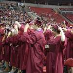 MIHS students participate in the traditional &ldquo;tassel flip.&rdquo; Katie Metzger/staff photo