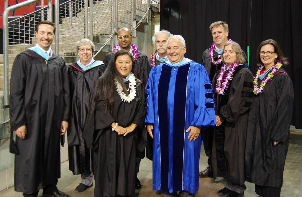 Superintendent Dr. Gary Plano poses with school administratiors Fred Rundle and Jennifer Wright, MIHS Principal Vicki Puckett and School Board members David D&rsquo;Souza, Dave Myerson, Ralph Jorgenson, Adair Dingle and Tracy Drinkwater before graduation. It was Plano&rsquo;s last Mercer Island commencement, as he plans to retire on June 30. Katie Metzger/staff photo
