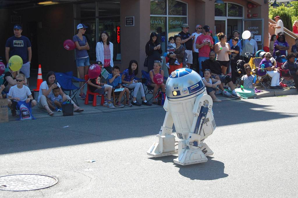 R2-D2 rolls down 78th Avenue Southeast during the parade. The theme for this year&rsquo;s Summer Celebration was &ldquo;Out of this World.&rdquo; Katie Metzger/staff photo