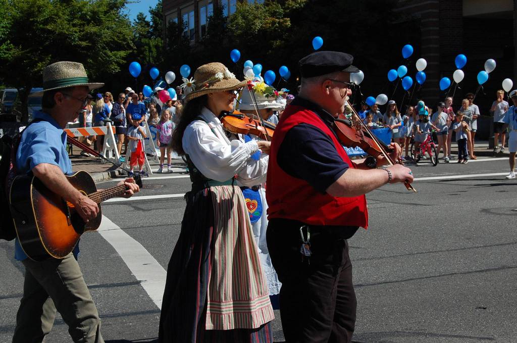 Members of the Cascade Lodge Sons of Norway play music while walking in the parade. Katie Metzger/staff photo