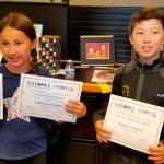 Isabelle Anderson, grade 3 winner of the Franca Martin Award for her water print &ldquo;Lunar New Year,&rdquo; and Douglas Anderson, grade 4 winner of the Jean Jack Memorial Award for his water print &ldquo;My Summer Dream,&rdquo; pose at the MIVAL Junior Art Show on July 8. Photo courtesy of Raleigh Nowers