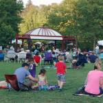 Islanders enjoy a Mostly Music in the Park concert on the Mercerdale lawn. File photo