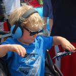 Tyler Woody of Bellevue plays with Blue Angels action figures. Katie Metzger/staff photo