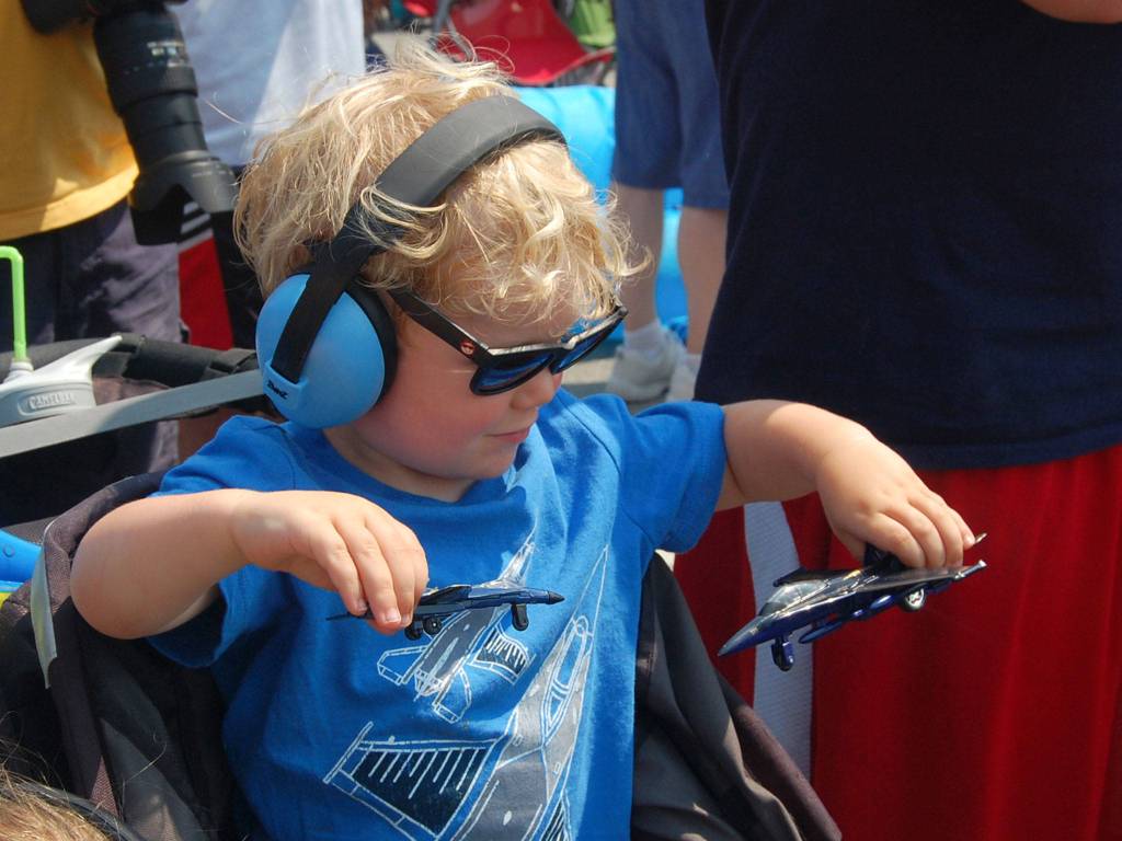 Tyler Woody of Bellevue plays with Blue Angels action figures. Katie Metzger/staff photo