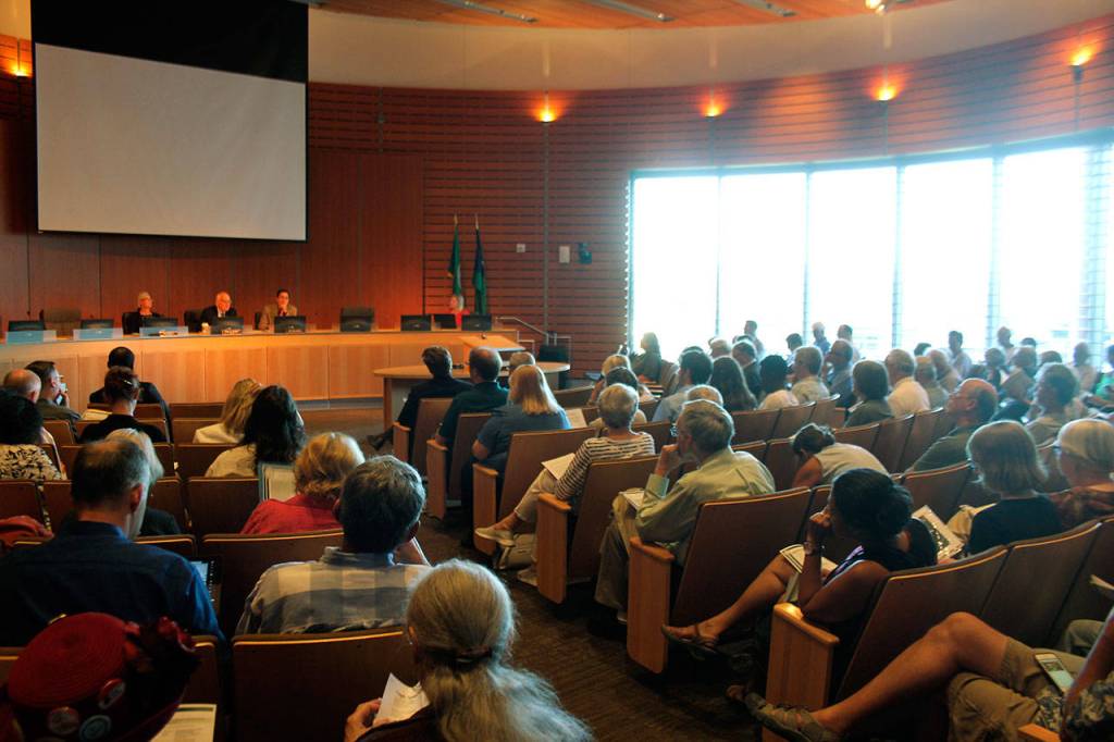 Residents countywide and environmental groups filled Bellevue City Hall&rsquo;s council chambers on Monday during a public hearing for Puget Sound Energy&rsquo;s rate case before the Washington State Utilities and Transportation Commission. Raechel Dawson/staff photo