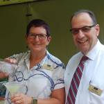 Marla Becker and Larry Almo of Aljoya smile at the 10th anniversary celebration of the Mercer Island Farmers Market, which was hosted by Aljoya in its garden patio. Katie Metzger/staff photo
