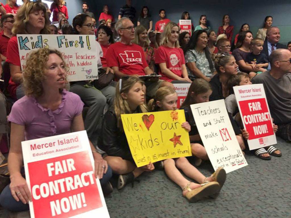 Mercer Island Education Association (MIEA) members and supporters pack the School Board meeting on Aug. 17, after holding a rally outside City Hall. Photo courtesy of MIEA