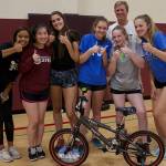MIHS girls’ volleyball team bonds by building bikes